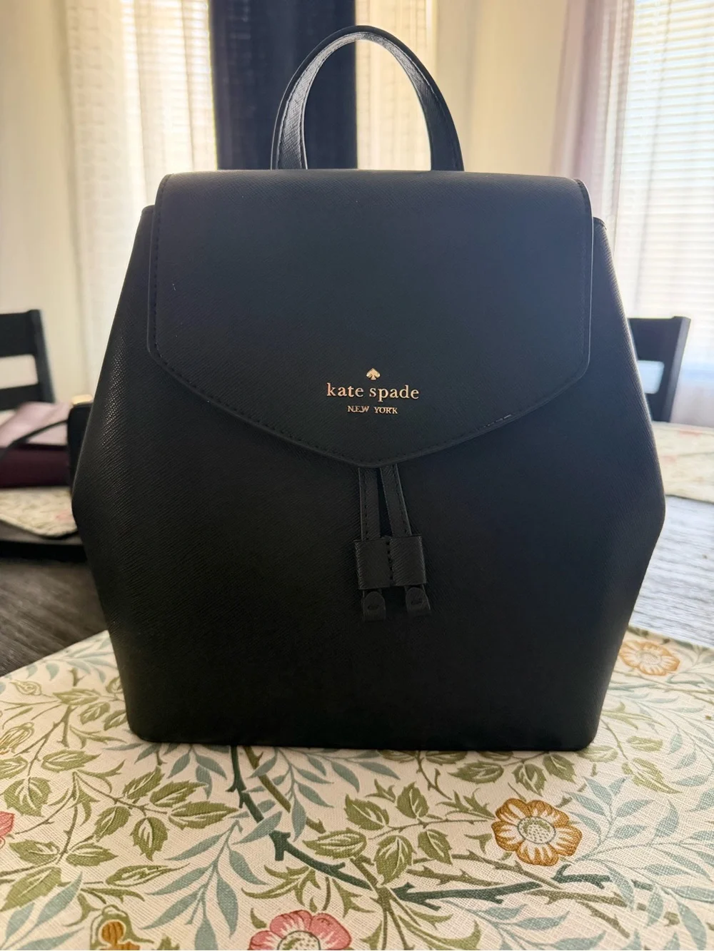kate spade black saffiano leather drawstring backpack